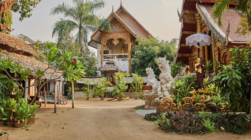 Traditional house surrounded by green trees near Chiang Mai