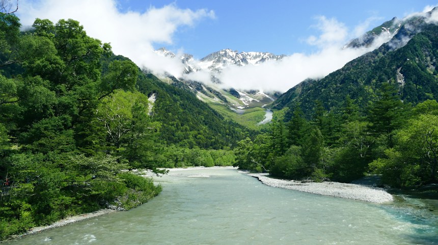 River flowing through a mountain valley in the Japanese Alps