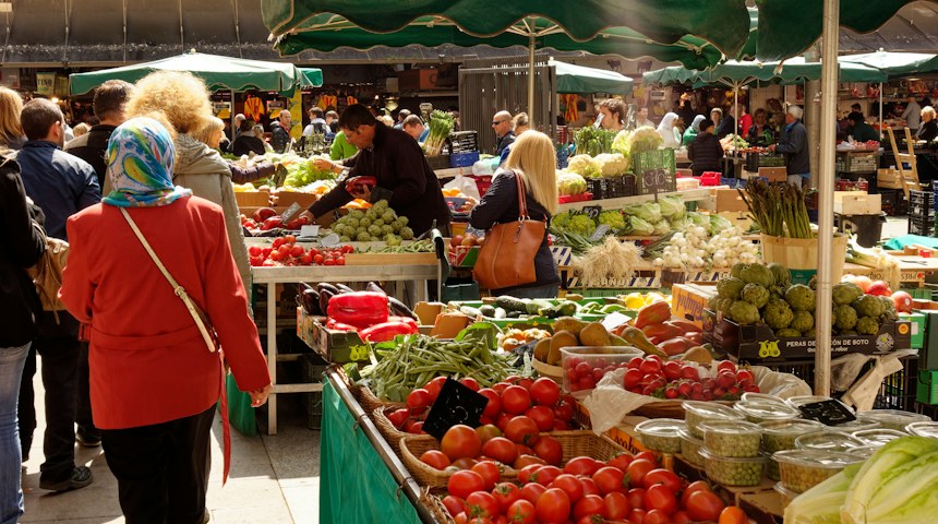 People shopping at a traditional French market