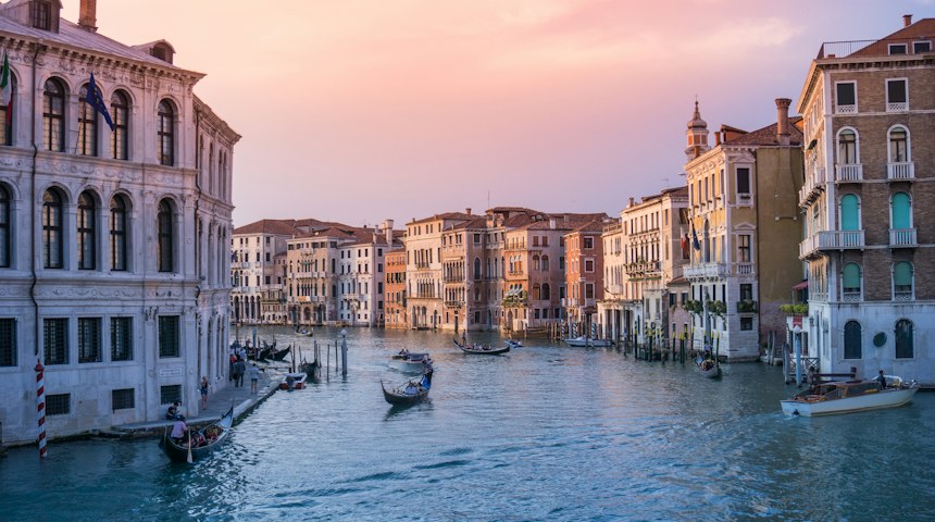 Gondolas moored on the Grand Canal in Venice