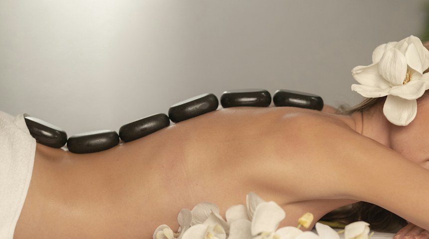 Guest relaxing during a massage at a Thai spa