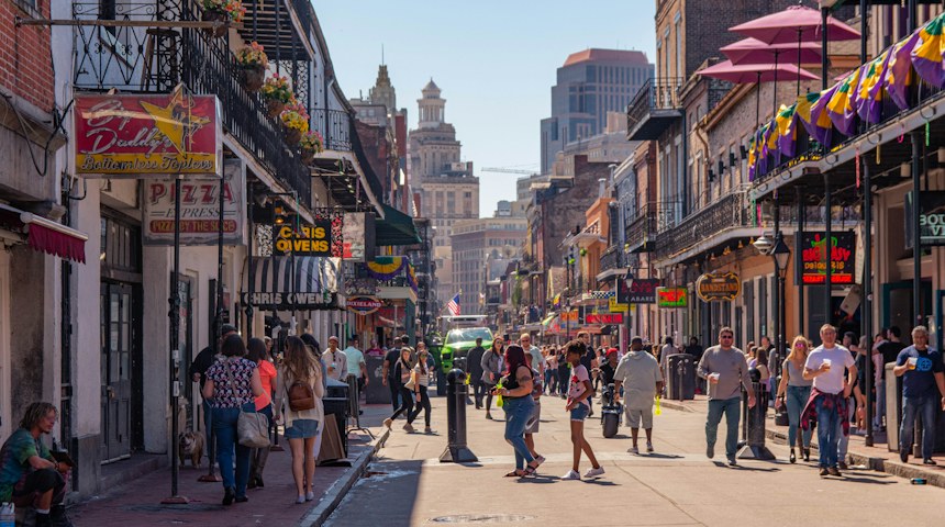 People walking through the French Quarter in New Orleans