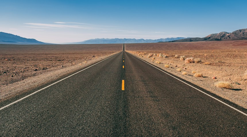 Open highway stretching through the desert in the USA